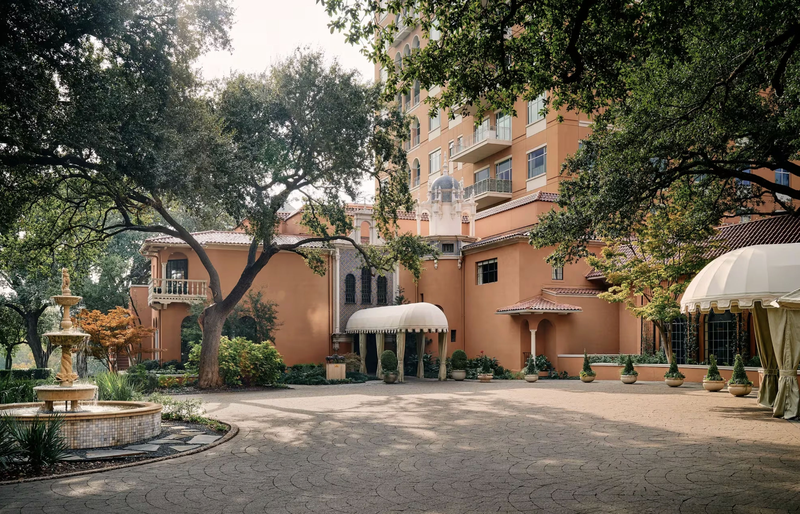 The Rosewood Mansion on Turtle Creek exterior with fountain and courtyard